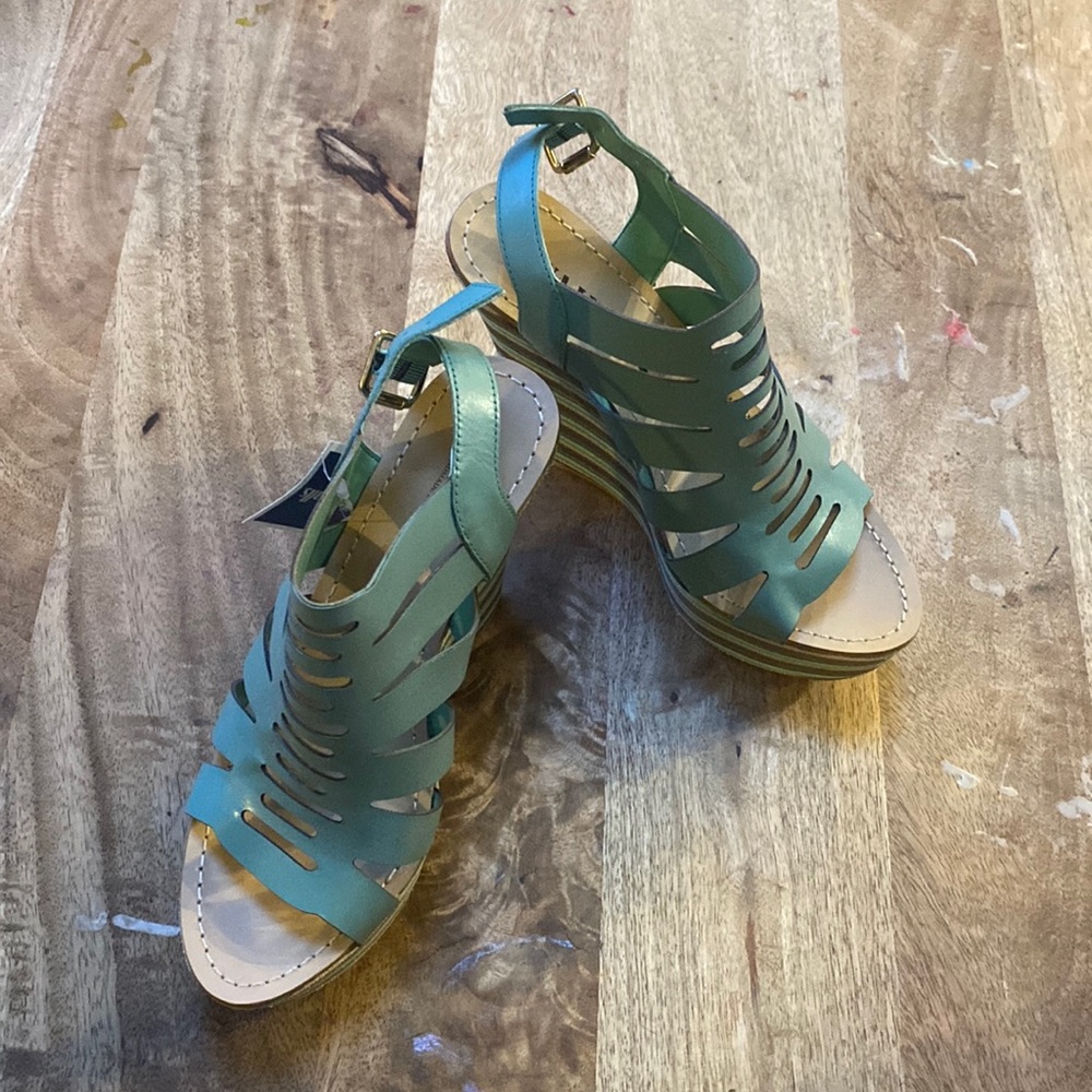 Brand new, genuine leather size 7.